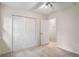 Neutral bedroom features carpeted floors and a closet for storage at 7275 Oswego Trl, Riverdale, GA 30296