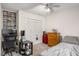 Bedroom features a workspace, a closet, and plenty of storage at 7275 Oswego Trl, Riverdale, GA 30296