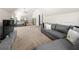 Spacious bedroom featuring a gray sectional couch and a cozy bed at 225 Mary Jane Ln, Covington, GA 30016
