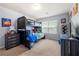 bedroom features a stylish black bunk bed and a blue color scheme with sonic decor at 225 Mary Jane Ln, Covington, GA 30016