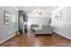 Spacious living room featuring a gray sectional sofa and modern fireplace at 225 Mary Jane Ln, Covington, GA 30016