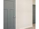 Image shows a hallway with blue doors and white walls at 2286 Carver Nw Dr, Atlanta, GA 30314