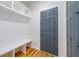 Mudroom features a gray door, storage cubbies and a bench at 2286 Carver Nw Dr, Atlanta, GA 30314