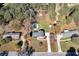 Sprawling property featuring a lovely in-ground pool and a charming home surrounded by lush trees and green space at 313 Fayette Villa Ct, Fayetteville, GA 30214