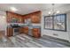 Charming kitchen featuring stainless steel appliances, granite countertops, ample cabinetry, and eat in breakfast area at 313 Fayette Villa Ct, Fayetteville, GA 30214