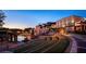 Stunning outdoor amphitheater with lawn seating and picturesque waterfront views, ideal for community gatherings and events at 5851 Swan Walk, Sugar Hill, GA 30518