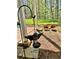 Backyard bird feeder with decorative hanging bird feeder and flower beds for the garden enthusiast at 5851 Swan Walk, Sugar Hill, GA 30518