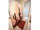 Bathroom featuring a cactus shower curtain and brown floors at 5851 Swan Walk, Sugar Hill, GA 30518