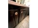 Detailed view of the bathroom cabinet knobs at 5851 Swan Walk, Sugar Hill, GA 30518