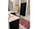 Bathroom with double sinks and a shower-tub combination at 5851 Swan Walk, Sugar Hill, GA 30518