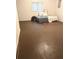 Bedroom featuring a bed, simple furnishings, and a window for natural light at 5851 Swan Walk, Sugar Hill, GA 30518