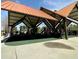 Shaded community playground featuring modern play equipment, rubber safety surfacing, and ample space for activities at 5851 Swan Walk, Sugar Hill, GA 30518