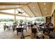 Open-air dining patio with scenic golf course views at 7405 Richmond Way, Cumming, GA 30040
