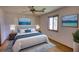 Serene bedroom with a queen bed, soft lighting, and calming wall art creating a peaceful atmosphere at 2140 Teri Ln, Conyers, GA 30013