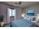 Stylish bedroom with a plush bed, neutral decor, and ample natural light creating a cozy retreat at 2140 Teri Ln, Conyers, GA 30013