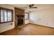 Spacious living room featuring a stone fireplace, large windows, and ample natural light at 2140 Teri Ln, Conyers, GA 30013