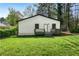 Spacious backyard showing a large lawn and deck, great for entertaining and outdoor activities at 437 Collier Ridge Nw Dr, Atlanta, GA 30318