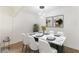 Stylish dining area with marble-top table, modern decor, and new flooring at 437 Collier Ridge Nw Dr, Atlanta, GA 30318