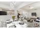 Dining area with marble table, modern decor, with a view into living and kitchen at 437 Collier Ridge Nw Dr, Atlanta, GA 30318