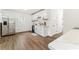 Bright kitchen featuring white cabinets, quartz countertops, and stainless steel appliances at 437 Collier Ridge Nw Dr, Atlanta, GA 30318