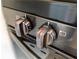 Close up view of the oven and range knobs at 437 Collier Ridge Nw Dr, Atlanta, GA 30318