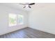 A sun-filled bedroom featuring energy-efficient windows and stylish flooring at 5469 Helen Pl Sw, Mableton, GA 30126