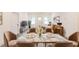 Elegant dining area with a marble table and plush seating at 5469 Helen Pl Sw, Mableton, GA 30126