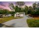 Landscaped property featuring a long driveway to the freshly remodeled home at 5469 Helen Pl Sw, Mableton, GA 30126