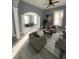 Inviting living room featuring hardwood floors, gray walls, and a decorative ceiling fan at 693 Dill Sw Ave, Atlanta, GA 30310