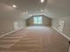 Finished attic space with carpeted floors and recessed lighting at 71 Dillard Ne Dr, Kennesaw, GA 30144