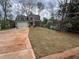 Well-maintained property with a spacious lawn and modern design elements at 71 Dillard Ne Dr, Kennesaw, GA 30144