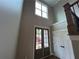 Bright foyer with double doors and a view of the staircase at 71 Dillard Ne Dr, Kennesaw, GA 30144