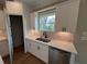 Kitchen featuring white cabinets, stainless steel appliances, and sleek countertops at 71 Dillard Ne Dr, Kennesaw, GA 30144