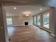 Bright living room with large windows, fireplace, and an open layout at 71 Dillard Ne Dr, Kennesaw, GA 30144