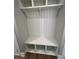 Mudroom with built-in storage bench and shelving for organizing at 71 Dillard Ne Dr, Kennesaw, GA 30144