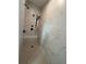 Modern tiled shower with bench seating and stylish fixtures at 71 Dillard Ne Dr, Kennesaw, GA 30144