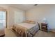 Comfortable bedroom features a double closet, neutral color scheme, and plush carpeting at 7415 Northampton Ct, Cumming, GA 30040