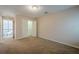 Bedroom featuring carpet, closet, and neutral paint at 7415 Northampton Ct, Cumming, GA 30040
