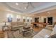 Open layout with billiards, living, and gaming areas with recessed lighting and neutral colors at 7415 Northampton Ct, Cumming, GA 30040