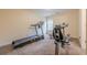 Home exercise room with treadmill and exercise bike, perfect for staying active at 7415 Northampton Ct, Cumming, GA 30040