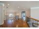 Second floor hallway with hardwood floors and lots of natural light at 7415 Northampton Ct, Cumming, GA 30040