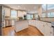 Spacious kitchen with white cabinets, granite countertops, and stainless steel appliances at 7415 Northampton Ct, Cumming, GA 30040
