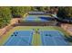 Aerial view of new community tennis courts for residents' enjoyment at 7415 Northampton Ct, Cumming, GA 30040