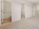 Bedroom featuring carpet flooring, attached bathroom, and walk-in closet at 13244 Tolstoy, Covington, GA 30014