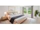 Bright bedroom features large windows, neutral decor, and a comfortable, inviting atmosphere at 3961 Brushy St, Powder Springs, GA 30127