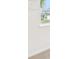 The image shows a bedroom with window view of the house next door at 3961 Brushy St, Powder Springs, GA 30127
