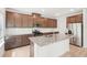 Modern kitchen with stainless steel appliances, granite countertops, and ample cabinet space at 3961 Brushy St, Powder Springs, GA 30127
