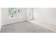 Bright empty room features two windows and a door at 3961 Brushy St, Powder Springs, GA 30127