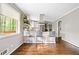 Open kitchen with a modern island and bar seating, offering stainless appliances and light-filled space for cooking at 4595 Fradon Ct, Atlanta, GA 30349