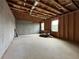 Unfinished basement ready for customization, featuring concrete floor, bare wood framing, and natural light at 5458 Summer Pine Pl, Buford, GA 30518